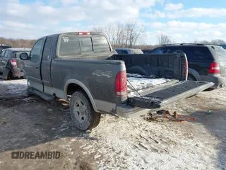2003 Ford F-150 XL with VIN 1FTRX18W63NA62642, listed as a IAAI auction lot 41407767 with 1 mi miles. Bid and sale history available at carsss.com. Image 3.