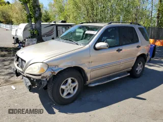 2003 Mercedes-Benz M 320 with VIN 4JGAB54EX3A373252, listed as a Copart auction lot 53985515 with 192,802 mi miles and Salvage title. Bid and sale history available at DreamBid. Image 1.