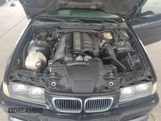 1998 BMW M3 z VIN WBSCD9326WEE09047, wystawiony jako Copart lot #54453485 z przebiegiem 165 827 mil mil oraz Szkody całkowita. Historia ofert i sprzedaży dostępna na DreamBid. Obrazek 11.