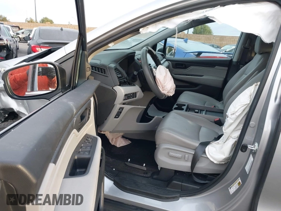 2022 Honda Odyssey EX-L with VIN 5FNRL6H77NB041754, listed as a IAAI auction lot 41791425 with 15,306 mi miles and . Bid and sale history available at DreamBid. Image 5.
