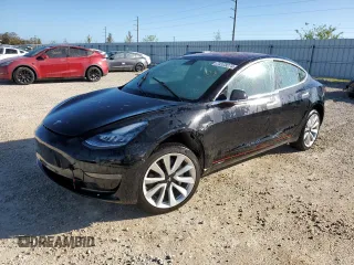 2019 Tesla Model 3 Mid Range z VIN 5YJ3E1EA3KF300335, wystawiony jako Copart lot #55259775 z przebiegiem Nie podano mil oraz Nie do naprawy. Historia ofert i sprzedaży dostępna na DreamBid. Obrazek 1.