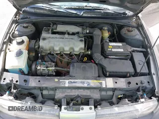 1997 Saturn SL z VIN 1G8ZH5285VZ117635, wystawiony jako IAAI lot #42153929 z przebiegiem 193 224 mil mil oraz . Historia ofert i sprzedaży dostępna na DreamBid. Obrazek 10.