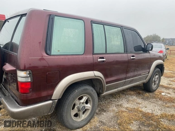 2002 Isuzu Trooper S with VIN JACDS58X727J02138, listed as a IAAI auction lot 41455245 with 186,560 mi miles and . Bid and sale history available at DreamBid. Image 4.