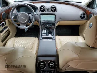 2018 Jaguar XJ Portfolio with VIN SAJWJ2GD9J8W15663, listed as a Copart auction lot 56734515 with 9,374 mi miles and Salvage Title. Bid and sale history available at DreamBid. Image 8.