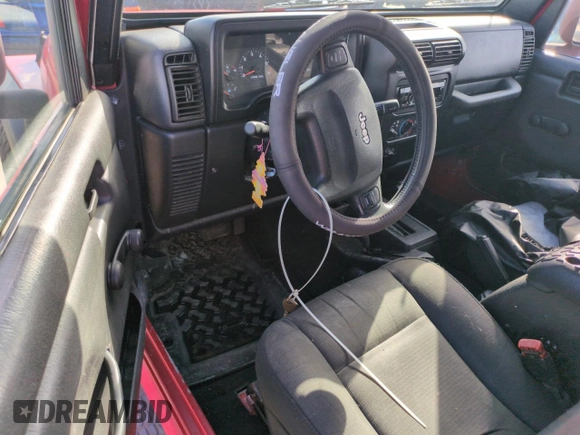 2006 Jeep Wrangler Sport with VIN 1J4FA49S06P718273, listed as a Copart auction lot 74676564 with 0 mi miles and Salvage Title. Bid and sale history available at carsss.com. Image 8.