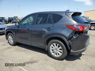 2016 Mazda CX-5 Touring with VIN JM3KE2CY2G0612029, listed as a Copart auction lot 53810155 with 159,915 mi miles and Salvage Title. Bid and sale history available at DreamBid. Image 2.