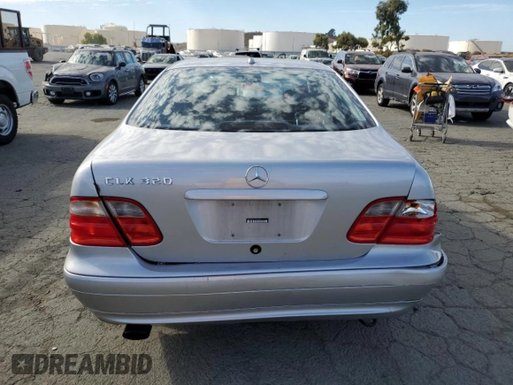 2000 Mercedes-Benz CLK 320/430 with VIN WDBLJ65G8YF122308, listed as a Copart auction lot 77449314 with 105,121 mi miles and Salvage Title. Bid and sale history available at DreamBid. Image 6.