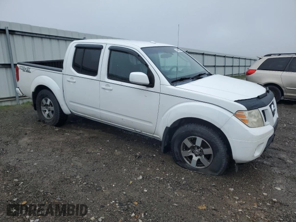 2010 Nissan Frontier Pro-4X with VIN 1N6AD0EV4AC404283, listed as a Copart auction lot 51495325 with 255,114 mi miles and Non repairable. Bid and sale history available at DreamBid. Image 4.