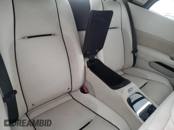 2014 Rolls-Royce Wraith z VIN SCA665C5XEUX84336, wystawiony jako Copart lot #73181343 z przebiegiem 34 367 mil mil oraz Szkody całkowita. Historia ofert i sprzedaży dostępna na DreamBid. Obrazek 10.
