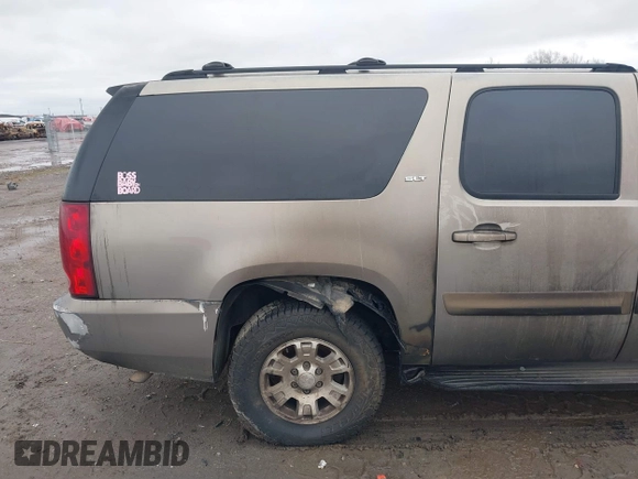 2007 GMC Yukon XL SLT with VIN 1GKFK16327J266852, listed as a IAAI auction lot 41198942 with 243,905 mi miles. Bid and sale history available at carsss.com. Image 14.