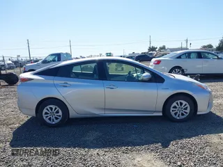 2017 Toyota Prius Two with VIN JTDKBRFU7H3032469, listed as a IAAI auction lot 42097816 with 65,853 mi miles and . Bid and sale history available at DreamBid. Image 13.