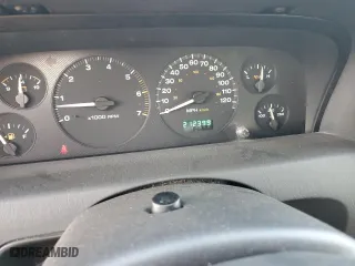 2002 Jeep Grand Cherokee Laredo with VIN 1J4GW48N32C180185, listed as a Copart auction lot 51988335 with 212,399 mi miles and Salvage Title. Bid and sale history available at carsss.com. Image 11.
