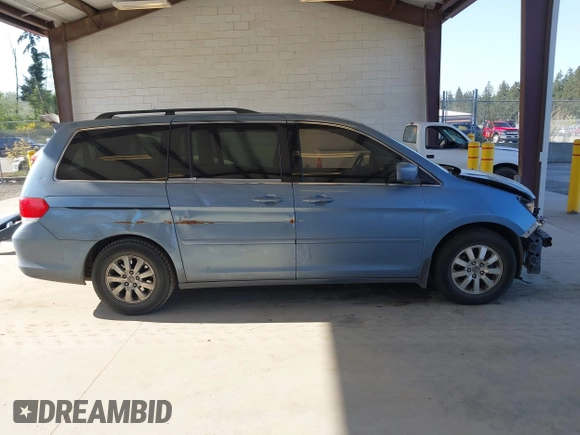 2010 Honda Odyssey EX-L with VIN 5FNRL3H61AB046416, listed as a IAAI auction lot 42157812 with 129,525 mi miles and . Bid and sale history available at DreamBid. Image 14.