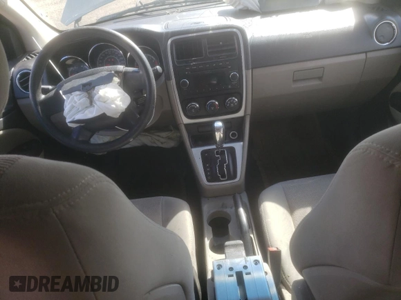 2010 Dodge Caliber SXT with VIN 1B3CB4HA2AD586417, listed as a Copart auction lot 47697675 with 150,021 mi miles and Salvage Title. Bid and sale history available at DreamBid. Image 8.