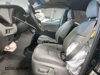 2015 Toyota Sienna XLE с VIN 5TDYK3DC9FS601304, выставлен на аукционе Copart как лот 51118295 с пробегом 153 121 миль миль и Списание • Salvage title. История ставок и продаж доступна на DreamBid. Изображение 7.