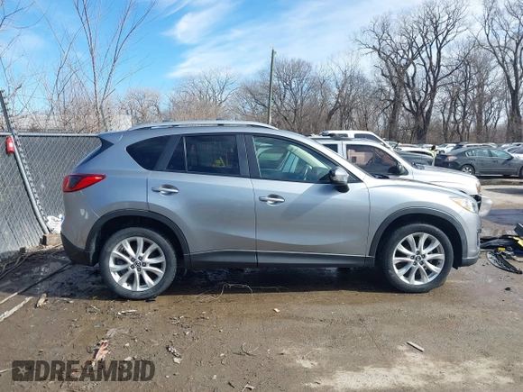 2014 Mazda CX-5 Grand Touring with VIN JM3KE2DY8E0375025, listed as a IAAI auction lot 41657755 with 103,601 mi miles. Bid and sale history available at carsss.com. Image 13.