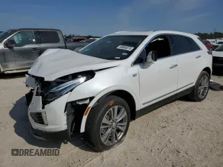 2024 Cadillac XT5 FWD Premium Luxury with VIN 1GYKNCRS1RZ735184, listed as a Copart auction lot 80688374 with 10,587 mi miles and Salvage Title. Bid and sale history available at carsss.com. Image 1.