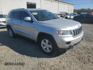 2011 Jeep Grand Cherokee Laredo with VIN 1J4RR4GG1BC714058, listed as a Copart auction lot 54974435 with 201,329 mi miles and Clean Title. Bid and sale history available at carsss.com. Image 4.