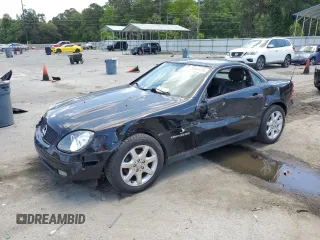 1999 Mercedes-Benz SLK 230/320 z VIN WDBKK47F1XF087644, wystawiony jako Copart lot #55441495 z przebiegiem 174 866 mil mil oraz Szkoda całkowita • Salvage title. Historia ofert i sprzedaży dostępna na DreamBid. Obrazek 1.