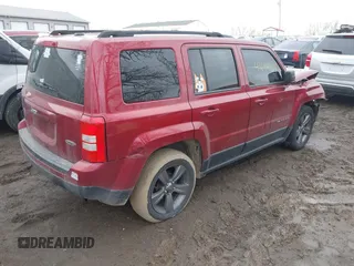 2014 Jeep Patriot Latitude with VIN 1C4NJPFA6ED856768, listed as a IAAI auction lot 41644104 with 133,287 mi miles and . Bid and sale history available at carsss.com. Image 4.