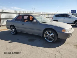 1992 Honda Accord z VIN 1HGCB7254NA015113, wystawiony jako Copart lot #77223284 z przebiegiem 219 007 mil mil oraz Szkoda całkowita • Salvage title. Historia ofert i sprzedaży dostępna na DreamBid. Obrazek 4.