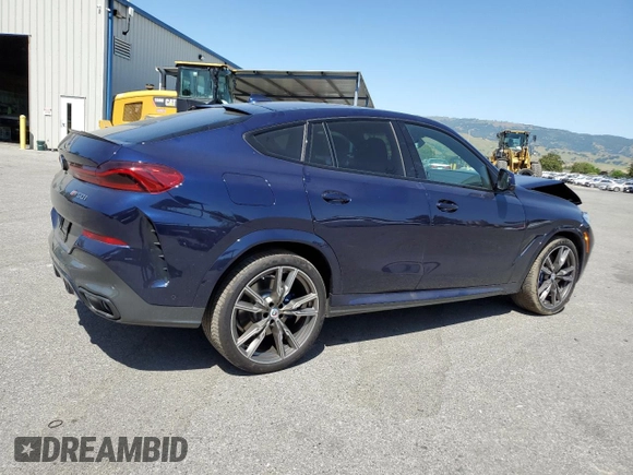 2023 BMW X6 M50i with VIN 5UXCY8C09P9P28422, listed as a Copart auction lot 52818133 with 4,131 mi miles and Salvage Title. Bid and sale history available at carsss.com. Image 3.