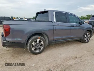 2017 Honda Ridgeline RTL с VIN 5FPYK2F55HB001824, выставлен на аукционе Copart как лот 63680045 с пробегом 84 552 миль миль и Списание • Salvage title. История ставок и продаж доступна на DreamBid. Изображение 3.