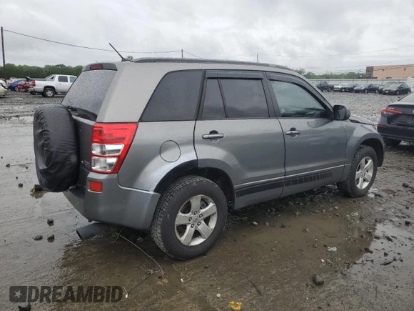 2009 Suzuki Grand Vitara z VIN JS3TD044794100716, wystawiony jako Copart lot #58739065 z przebiegiem 151 638 mil mil oraz Szkoda całkowita • Salvage title. Historia ofert i sprzedaży dostępna na DreamBid. Obrazek 3.