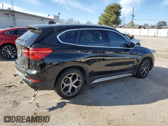 2016 BMW X1 xDrive28i z VIN WBXHT3C35G5E50005, wystawiony jako Copart lot #74476533 z przebiegiem 128 031 mil mil oraz Szkoda całkowita • Salvage title. Historia ofert i sprzedaży dostępna na DreamBid. Obrazek 3.
