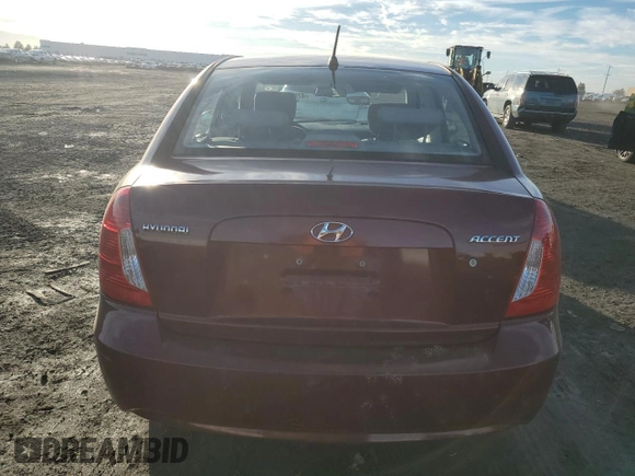 2006 Hyundai Accent GLS with VIN KMHCN46C86U047524, listed as a Copart auction lot 47071055 with 116,918 mi miles and Salvage Title. Bid and sale history available at carsss.com. Image 6.