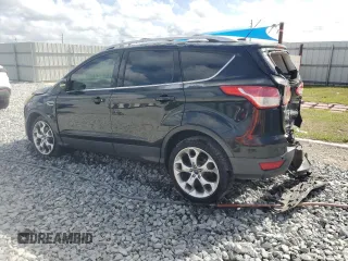 2014 Ford Escape Titanium with VIN 1FMCU0JX7EUA66831, listed as a Copart auction lot 51574815 with 204,150 mi miles and Salvage Title. Bid and sale history available at carsss.com. Image 2.