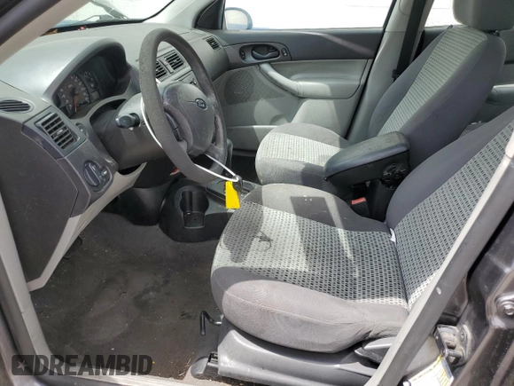 2006 Ford Focus SE with VIN 1FAHP36N56W223049, listed as a Copart auction lot 61211745 with 185,609 mi miles and Salvage title. Bid and sale history available at DreamBid. Image 7.