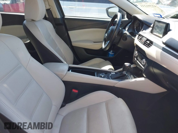 2016 Mazda 6 i Grand Touring with VIN JM1GJ1W57G1403028, listed as a IAAI auction lot 41591235 with 110,079 mi miles and . Bid and sale history available at carsss.com. Image 5.