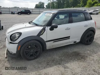 2014 MINI Countryman S with VIN WMWZC3C53EWP27156, listed as a Copart auction lot 59579765 with 159,308 mi miles and Salvage title. Bid and sale history available at DreamBid. Image 1.