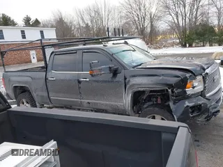 2016 GMC Sierra 2500HD Denali z VIN 1GT12UE81GF128498, wystawiony jako IAAI lot #41346398 z przebiegiem 164 532 mil mil oraz . Historia ofert i sprzedaży dostępna na DreamBid. Obrazek 13.