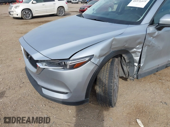 2017 Mazda CX-5 Grand Touring with VIN JM3KFBDL8H0227348, listed as a IAAI auction lot 41572377 with 124,908 mi miles. Bid and sale history available at carsss.com. Image 6.