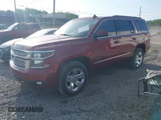 2016 Chevrolet Tahoe LT z VIN 1GNSCBKC2GR470918, wystawiony jako IAAI lot #42054150 z przebiegiem 140 491 mil mil oraz . Historia ofert i sprzedaży dostępna na DreamBid. Obrazek 2.