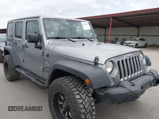 2014 Jeep Wrangler Unlimited Sport with VIN 1C4BJWDG3EL311671, listed as a IAAI auction lot 42477029 with 89,044 mi miles and . Bid and sale history available at DreamBid. Image 1.