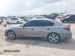 2021 Infiniti Q50 Sensory with VIN JN1EV7CP5MM703829, listed as a IAAI auction lot 41951117 with 60,314 mi miles and . Bid and sale history available at DreamBid. Image 15.