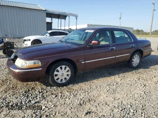 2003 Mercury Grand Marquis LS Premium with VIN 2MEFM75W03X606245, listed as a Copart auction lot 50795125 with 207,117 mi miles and Salvage Title. Bid and sale history available at DreamBid. Image 1.