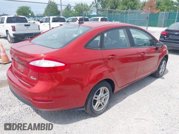 2018 Ford Fiesta SE z VIN 3FADP4BJ1JM132084, wystawiony jako IAAI lot #42296074 z przebiegiem 62 852 mil mil oraz . Historia ofert i sprzedaży dostępna na DreamBid. Obrazek 4.