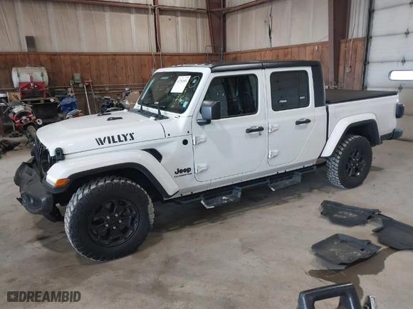 2021 Jeep Gladiator Texas Trail with VIN 1C6HJTAG3ML548261, listed as a IAAI auction lot 41791595 with 34,582 mi miles. Bid and sale history available at carsss.com. Image 2.