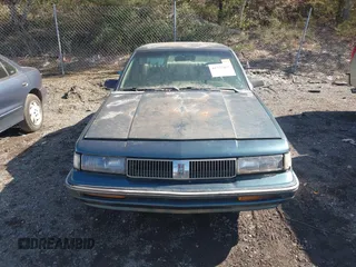 1993 Oldsmobile Cutlass Ciera S with VIN 1G3AG55N5P6317040, listed as a IAAI auction lot 41777055 with 208,984 mi miles and . Bid and sale history available at DreamBid. Image 6.