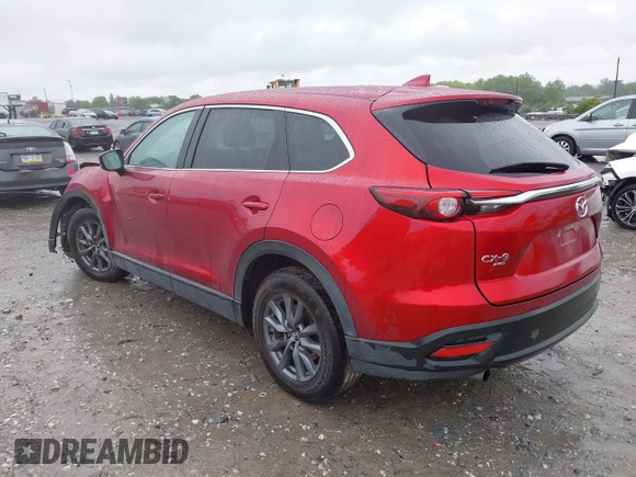 2022 Mazda CX-9 Touring with VIN JM3TCBCY9N0613508, listed as a IAAI auction lot 42258870 with 46,911 mi miles and . Bid and sale history available at DreamBid. Image 3.