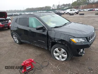 2019 Jeep Compass Latitude with VIN 3C4NJDBB3KT689174, listed as a IAAI auction lot 41843137 with 56,722 mi miles. Bid and sale history available at carsss.com. Image 1.