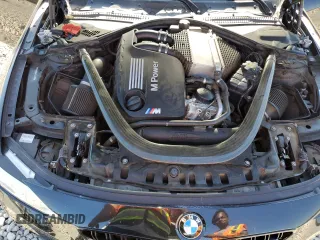 2015 BMW M4 with VIN WBS3R9C54FK334052, listed as a Copart auction lot 67044522 with 69,998 mi miles. Bid and sale history available at carsss.com. Image 7.