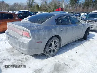 2014 Dodge Charger SXT with VIN 2C3CDXJG2EH135638, listed as a IAAI auction lot 41557427 with 83,536 mi miles. Bid and sale history available at carsss.com. Image 4.