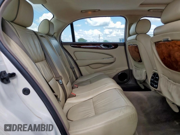 2006 Jaguar XJ Vanden Plas with VIN SAJWA82B16SH06996, listed as a Copart auction lot 62509025 with 80,236 mi miles and Salvage title. Bid and sale history available at DreamBid. Image 10.