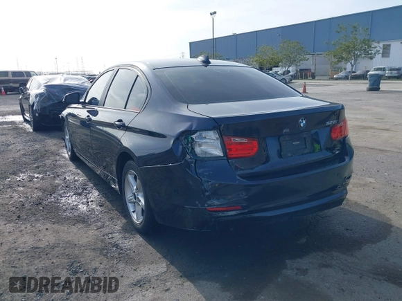 2013 BMW 3 Series 328i with VIN WBA3C1C58DK103904, listed as a IAAI auction lot 41590683 with 108,615 mi miles. Bid and sale history available at carsss.com. Image 3.