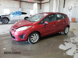 2013 Ford Fiesta SE with VIN 3FADP4EJ6DM173438, listed as a Copart auction lot 53452075 with 57,726 mi miles and Salvage Title. Bid and sale history available at DreamBid. Image 1.